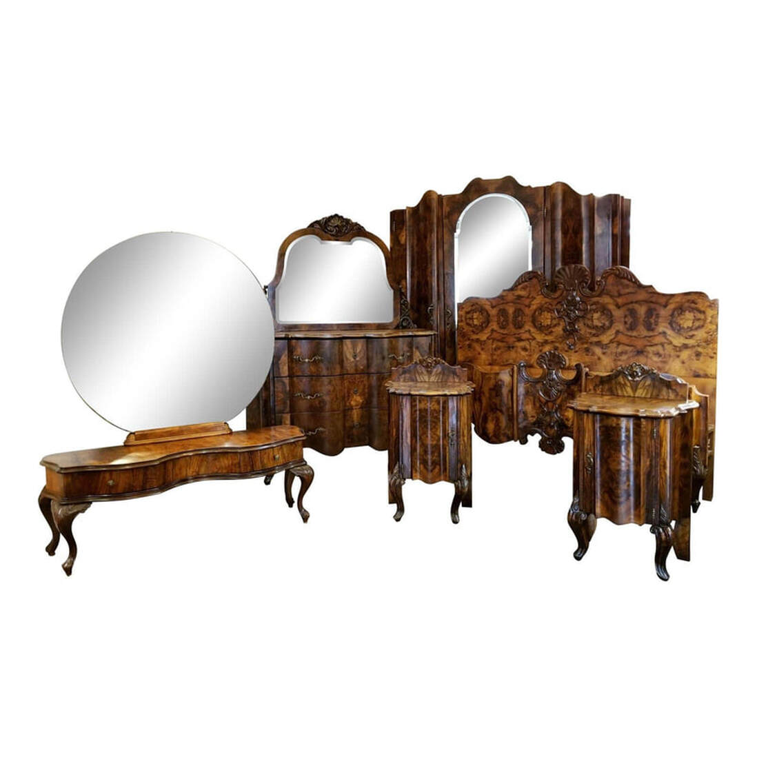 Italian Olive Wood Neo-Rococo Venetian Baroque Six Piece Bedroom Suite  Scarce and stunning six-piece bedroom suite in the Italian Neo-Rococo / Venetian Baroque styles popular throughout Europe in the mid-to-late 19th century.  This suite is made with Italian burled olive wood veneers, except for the dressing table constructed with burled walnut veneers.  We attribute the manufacture of these furniture pieces to Fratelli Testolini; also known as the Testolini Brothers, Testolini Venise, and Testolini Freres Muebles; of Venice, Italy.  Fratelli Testolini was founded by two Italian brothers and became the most highly regarded manufacturers for nearly a century of art furniture, wood carvings, mosaics, marbles, jewellery, Murano art glass, and table glass.  After the deaths of the founders, two cousins inherited the business. One did not care for the business and created a merger for distribution of goods with Antonio Salviati, maker of glass, mosaics, and carved art furniture, and Jesurum. From 1902 through 1906 the business was held by The Venice Art Company of Venice and London and was known as Salviati, Jesurum & Co and as Salviati & Testolini as well as Testolini & Salviati.  After the dissolution of the merger, Marco Testolini attempted to recover the business and maintained one carpentry workshop focused on casting furniture for other companies. Marco could never regain the previous success of the business and gave in to the sale of the workshop.  Between 1847 and the 1902 merger, the Testolini Brothers were extremely successful with their original designs of 
