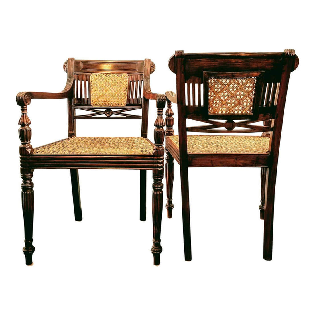 Raffles type dining armchairs or side chairs were hand crafted by The Raj Company in Mumbai, India in the 1990s.  These are called the 